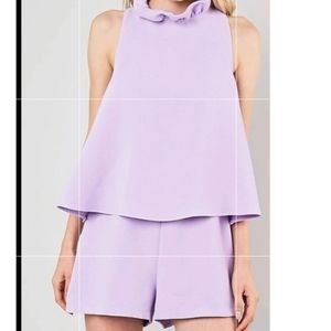 DO+BE romper ruffle neck, lined ties around neck in neck and zips. New with tags